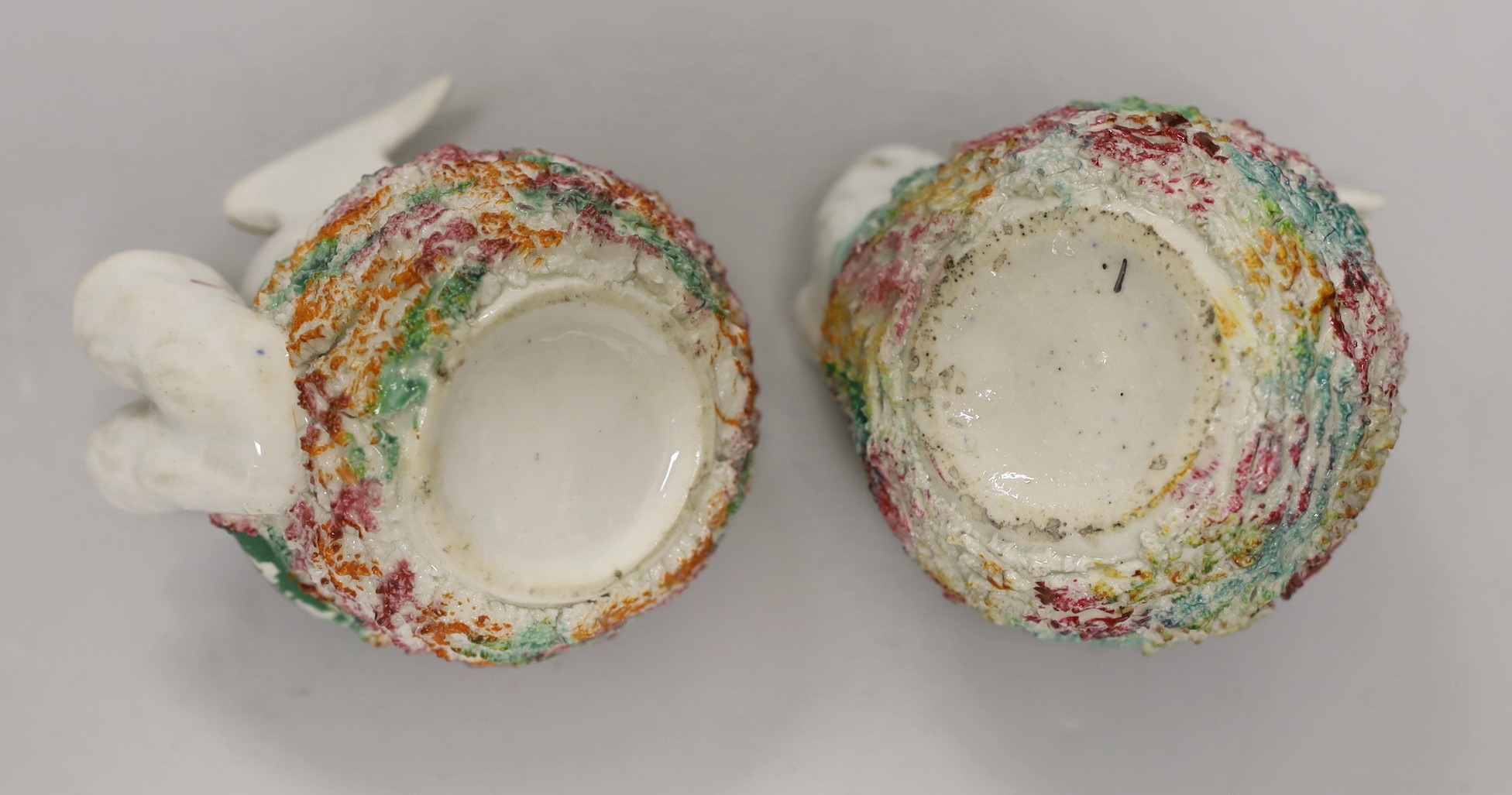 Two similar Staffordshire porcelain 'bird's nest' quill holders, c.1830-50